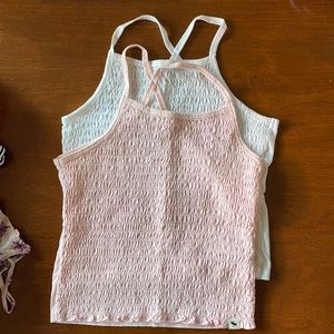 2 tanks like new and 1 short sleeve